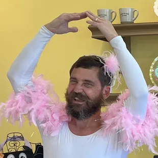 Let&apos;s just say the tutu and feather boa are feeling a bit too at home. Mitch, fully embracing the fabulous side of life.
