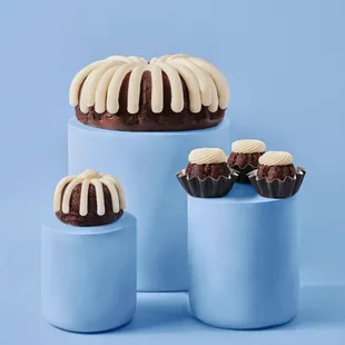 three bundt cakes with frosting