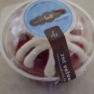 a bundt cake in a plastic container