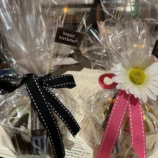 two bundt cakes wrapped in plastic bags