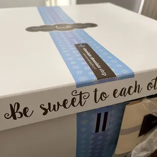 Cake box opens to reveal this message