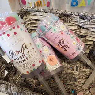 Push pops!  Poms Poms or confetti filled.