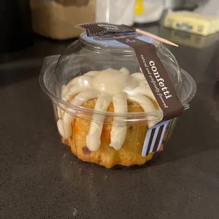 a bundt cake in a plastic container