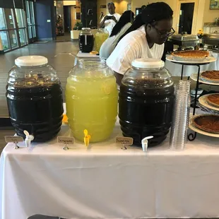 a woman preparing a buffet