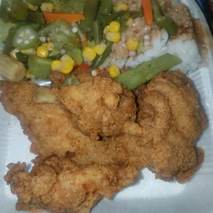Fried chicken mixed veggies and rice and gravy