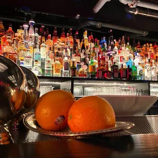 oranges on a bar counter