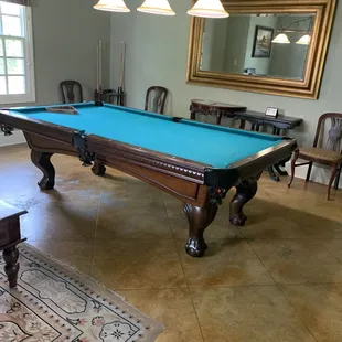 Pool table in recreation room
