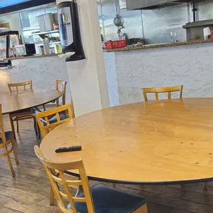 a table and chairs in a restaurant