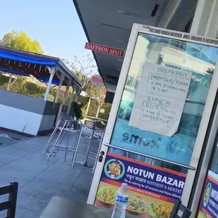 a table and chairs outside a restaurant