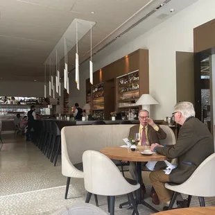 two people sitting at a table