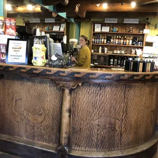 a woman behind the counter