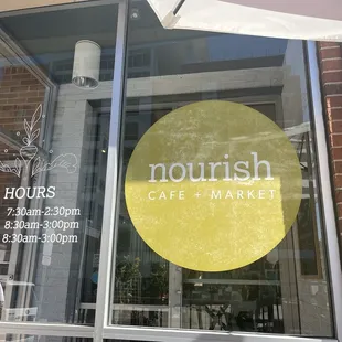 Exterior sign with hours