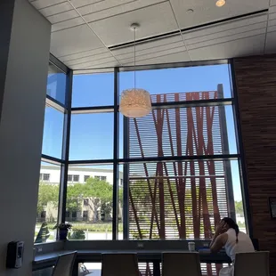 a woman sitting at a table