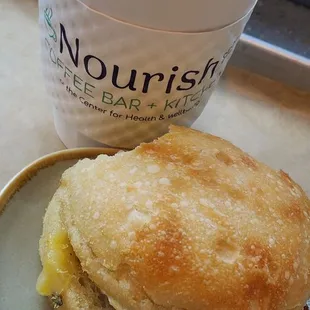 Oatmilk latte and 9 o&apos;clock somewhere sandwich