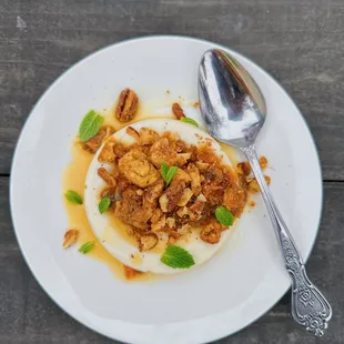 a plate of food on a wooden table