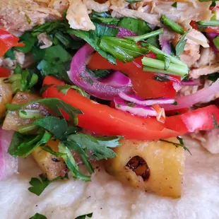 a chicken salad on a tortilla