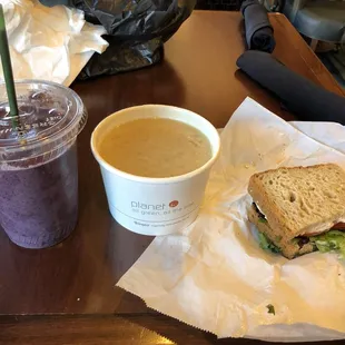 Smoothie and half sandwich.