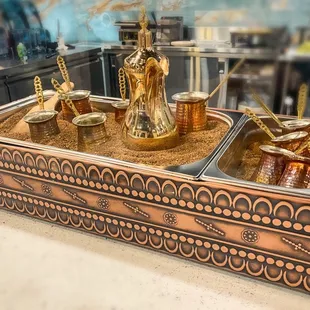 Traditional Turkish coffee brewed over heated sand