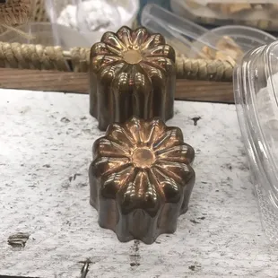 November 2018 (photo taken at the Holy Family Holiday Boutique). Canele molds :)