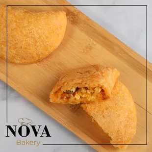 two pastries on a cutting board