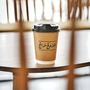 a cup of coffee on a table