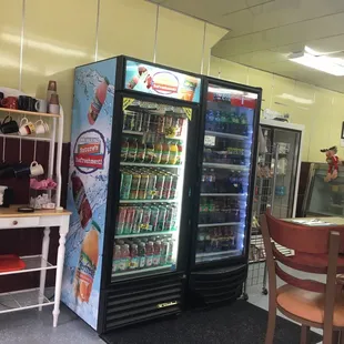Cute coffee stand and plenty of drinks in the fridge!