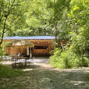 a patio area in the woods