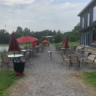patio area with tables and umbrellas