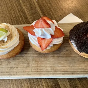 Key lime donut, strawberries and cream donut, dirt donut