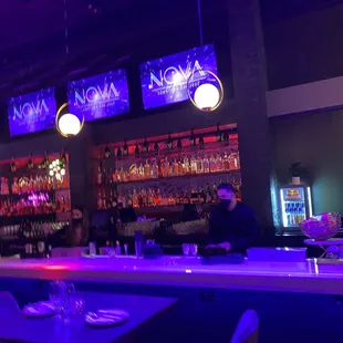 a bar with neon lights