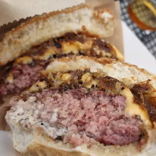 Knob Creek burger 6 August 2023         Smoked &amp; Seared Burger, American Cheese, Smoked Pork Belly, Bourbon Braised Onions, Pickles, Knob C