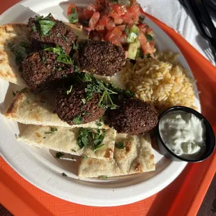 a plate of food on a tray