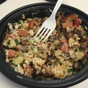 Make your own bowl. Chicken, tomato and cucumber salad, and tzatziki. Yum!