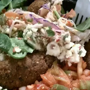 Falafel salad with relish and slaw.