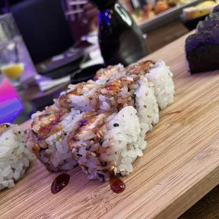 Tempura White Fish Roll and a Yellowtail Scallion Roll to the far right.