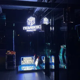 a neon sign in a dark room