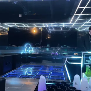 a man standing in front of a stage