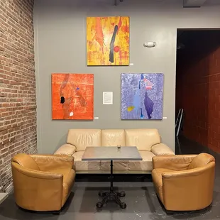 two leather sofas and a coffee table