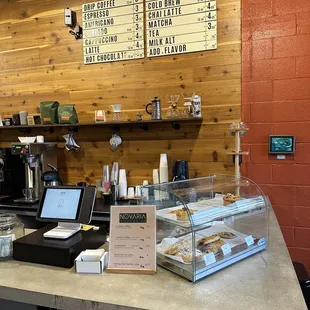 a counter with a laptop on it