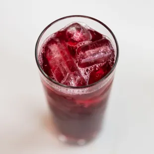 a glass filled with ice cubes