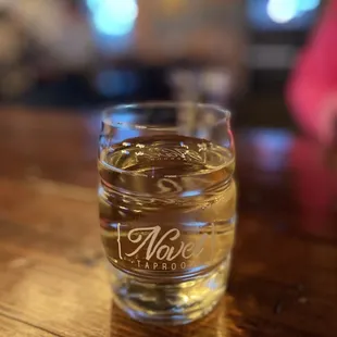 a glass of water on a table
