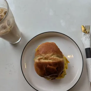 Iced latte and egg on potato bun