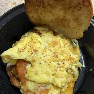 Cheesy Eggs on Brioche