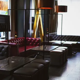 Partitions between all seating as well as QR code menus, and hand sanitizer widely available per seating arrangement.