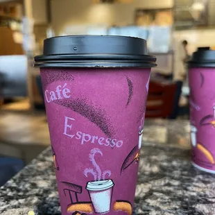 a cup of coffee and a donut