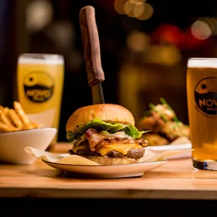 a burger and a glass of beer