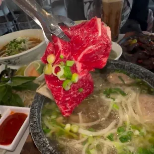 Rare Steak Pho Hot Stone Bowl! -   

Video credit of The Munchies