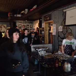 a group of people in a bar