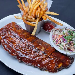  a plate of ribs and fries