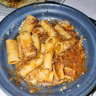  a plate of pasta with meat sauce